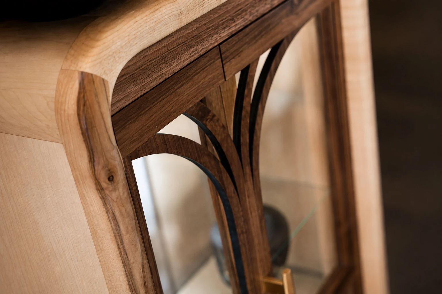 Structural detail showing curved and shaped dark wood elements